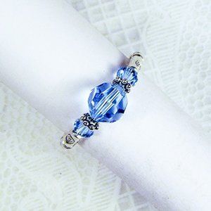 Cynthia Lynn "CELEBRATE" Blue Swarovski Crystal Dec. Birthstone Stretch Ring